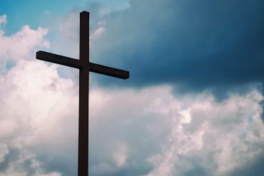 cross against a blue sky