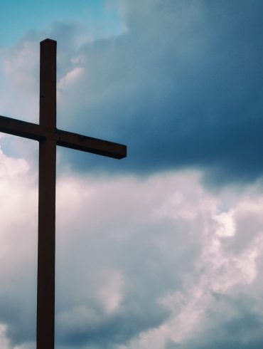 cross against a blue sky